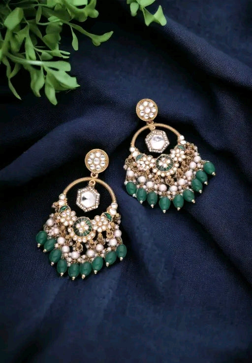 Green chandelier type earrings